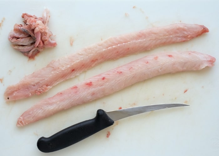 fillet the Gar fish to remove the dark meat and connective tissue, ensuring you have clean, delicious fillets ready to cook